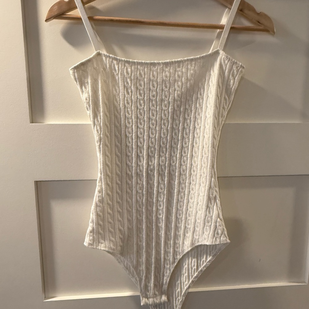 CRYBABY KNIT BODYSUIT